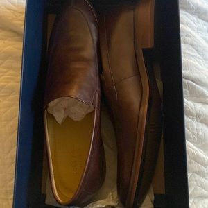 Only worn twice , brand new , dark brown Cole Haan Mens Slip- On loafers.Size 13